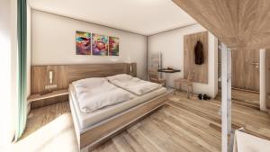 una camera con un letto in una stanza di Hostel Maria Alm a Maria Alm am Steinernen Meer