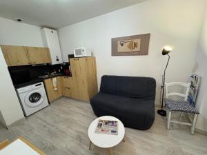 Η κουζίνα ή μικρή κουζίνα στο Les Flots du Quai