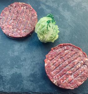 two hamburgers and a cabbage on a table at Domaine du Fourtet in Arfons +37 photos