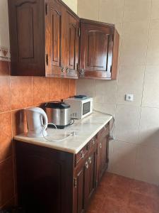 Kuchyň nebo kuchyňský kout v ubytování Micaelense Guest House + 20 fotografií