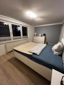 En eller flere senge i et værelse på Ferienwohnung