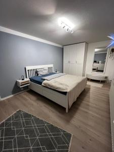 En eller flere senge i et værelse på Ferienwohnung + 13 billeder