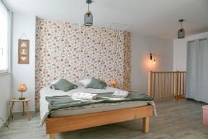 Postel nebo postele na pokoji v ubytování La Source Du Bonheur -Clim Parking