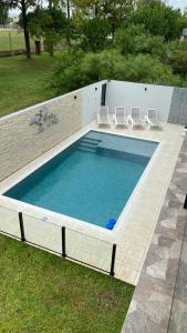 Swimmingpoolen hos eller tæt på El Rincón del Bosque