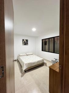 Postel nebo postele na pokoji v ubytování El Brillante