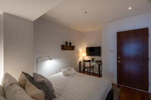 Ліжко або ліжка в номері Les Immeubles Charlevoix - Le 1173 +3 фото