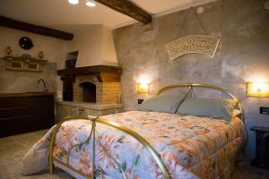 En eller flere senge i et værelse på Antico maniero La Ploca