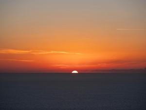 Solopgangen eller solnedgangen set fra feriehuset