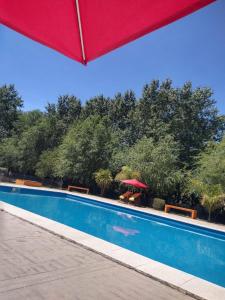Swimmingpoolen hos eller tæt på Cabañas y Camping El Gringo