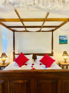 En eller flere senge i et værelse på Sunburst Villa