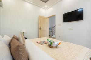 Et tv og/eller underholdning på Rahat by The StayCationer