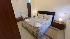 Postel nebo postele na pokoji v ubytování Soverato con Vista