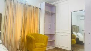 En eller flere senge i et værelse på Perfect Home