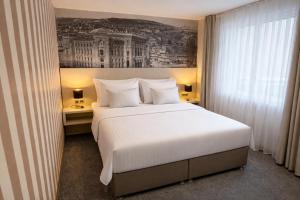 Ένα ή περισσότερα κρεβάτια σε δωμάτιο στο Hotel Villa Harmony - Free Parking +36 φωτογραφίες