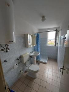 Koupelna v ubytování Apartma Epulonova1 Novigrad