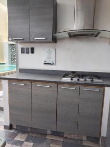 Køkken eller tekøkken på Oasis Urbano