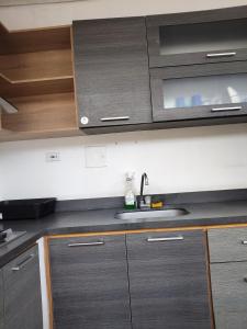 Køkken eller tekøkken på Oasis Urbano + 2 billeder