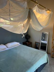 Ένα ή περισσότερα κρεβάτια σε δωμάτιο στο Casa Marea a 300 M do mar - 10 min de Serra Grande +66 φωτογραφίες