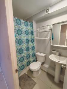 Ένα μπάνιο στο Departametno 3 Dormitorios 2 Baños FULL EQUIPADO