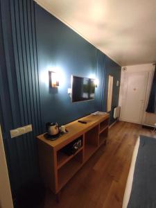 Μια τηλεόραση ή/και κέντρο ψυχαγωγίας στο Hôtel Monet