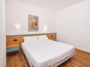 Voodi või voodid majutusasutuse B&B HOTEL Eurorest Conegliano toas +32 fotot