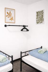 Postel nebo postele na pokoji v ubytování Brody Apartments - gemütlich wohnen nähe Büdingen