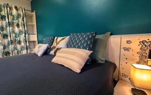 Ένα ή περισσότερα κρεβάτια σε δωμάτιο στο Chambre CLAIRIERE