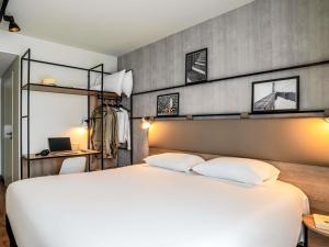 Postel nebo postele na pokoji v ubytování ibis Bordeaux Nord Carbon Blanc + 72 fotografií