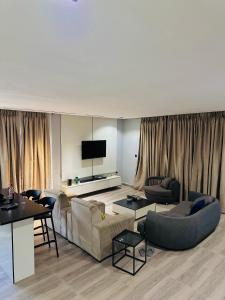 TV a/nebo společenská místnost v ubytování House 19