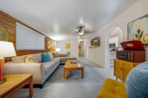 a living room with a couch and a table at 24th St (Deepak & Jackie) in Tucson
