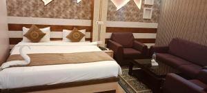 Giường trong phòng chung tại Hotel Mount View