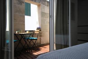 En eller flere senge i et værelse på Casa Trast