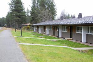 a row of houses on the side of a road at Spacious Apartment for 5 in Sodankylä