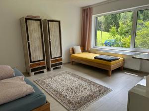 Ένα ή περισσότερα κρεβάτια σε δωμάτιο στο Schneealpe