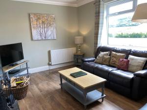 Et opholdsområde på East Cottage at Parbroath Farm