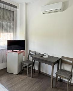 Μια τηλεόραση ή/και κέντρο ψυχαγωγίας στο Főnix Rezidencia Pápa