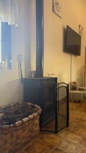 Et tv og/eller underholdning på Apartamento Rural Vainilla