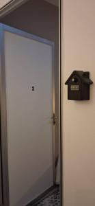 a door with a mailbox on top of it at Cozy Nook in George Town