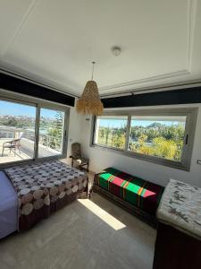 Postel nebo postele na pokoji v ubytování Private Suite and Rooftop - Charming Villa in Tangier