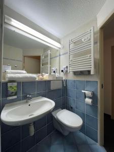 Ένα μπάνιο στο Sure Hotel by Best Western Limoges Sud