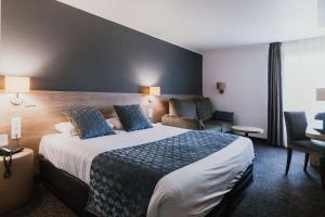 Ένα ή περισσότερα κρεβάτια σε δωμάτιο στο Sure Hotel by Best Western Limoges Sud