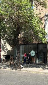 a group of people standing in front of a store at Altos de Barrio Sur in San Miguel de Tucumán