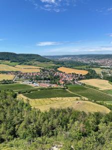 an aerial view of a village in the hills at Ferienhaus Jena - Feuer und Flamme in Jena +37 photos