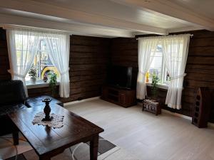 Posezení v ubytování Tømmerhus i sentrum av Lofoten-Stamsund