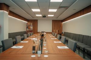 a conference room with a long table and chairs at DIAGONAL HOTEL Tanger in Tangier +108 photos