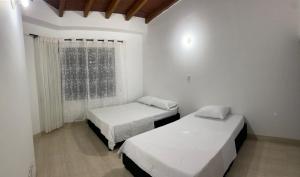 Postel nebo postele na pokoji v ubytování Gran casa comoda + 7 fotografií