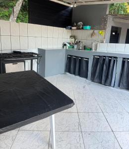 Kuchyň nebo kuchyňský kout v ubytování Pousada Praia Grande de Palmas