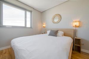 Кровать или кровати в номере Sky Living para 4 con Parking en Sanchinarro +17 фотографий