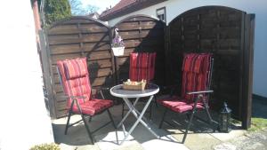 En terrasse eller udendørsområde på Ferienhaus Insel Rügen