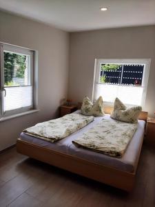 En eller flere senge i et værelse på Ferienwohnung in Röbel Müritz